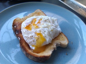 Poached Egg on toast with yolk broken